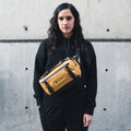 Dallol Yellow Lifestyle Image Six Liter ROGUE Sling