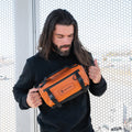 Sedona Orange Lifestyle Image Six Liter ROGUE Sling