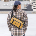 Dallol Yellow Lifestyle Image Nine Liter ROGUE Sling